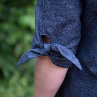 Sleeve detail of the Emelia, A-Line Dress Sewing Pattern in Navy Blue Fabric