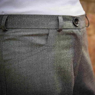 Lady Wearing The Portia Trouser Sewing Pattern In A Grey Fabric- Waistband detail